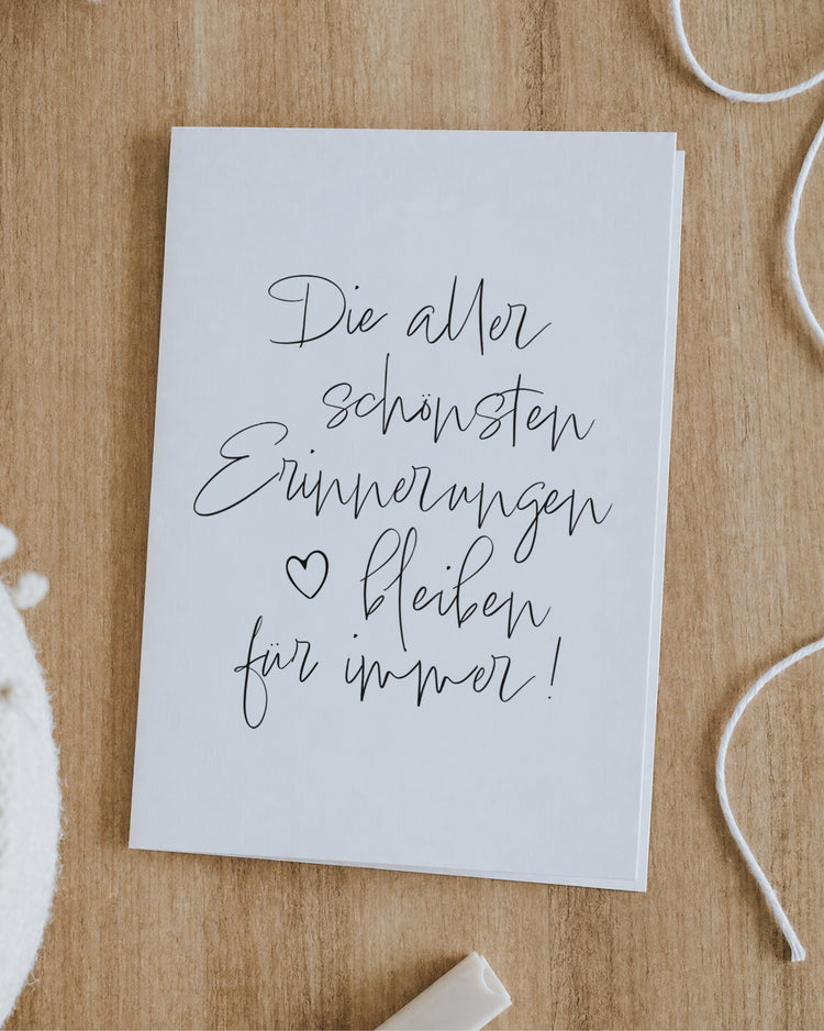 Klappkarte mit Spruch „Die allerschönsten Erinnerungen bleiben für immer!“ in Schwarz-Weiß