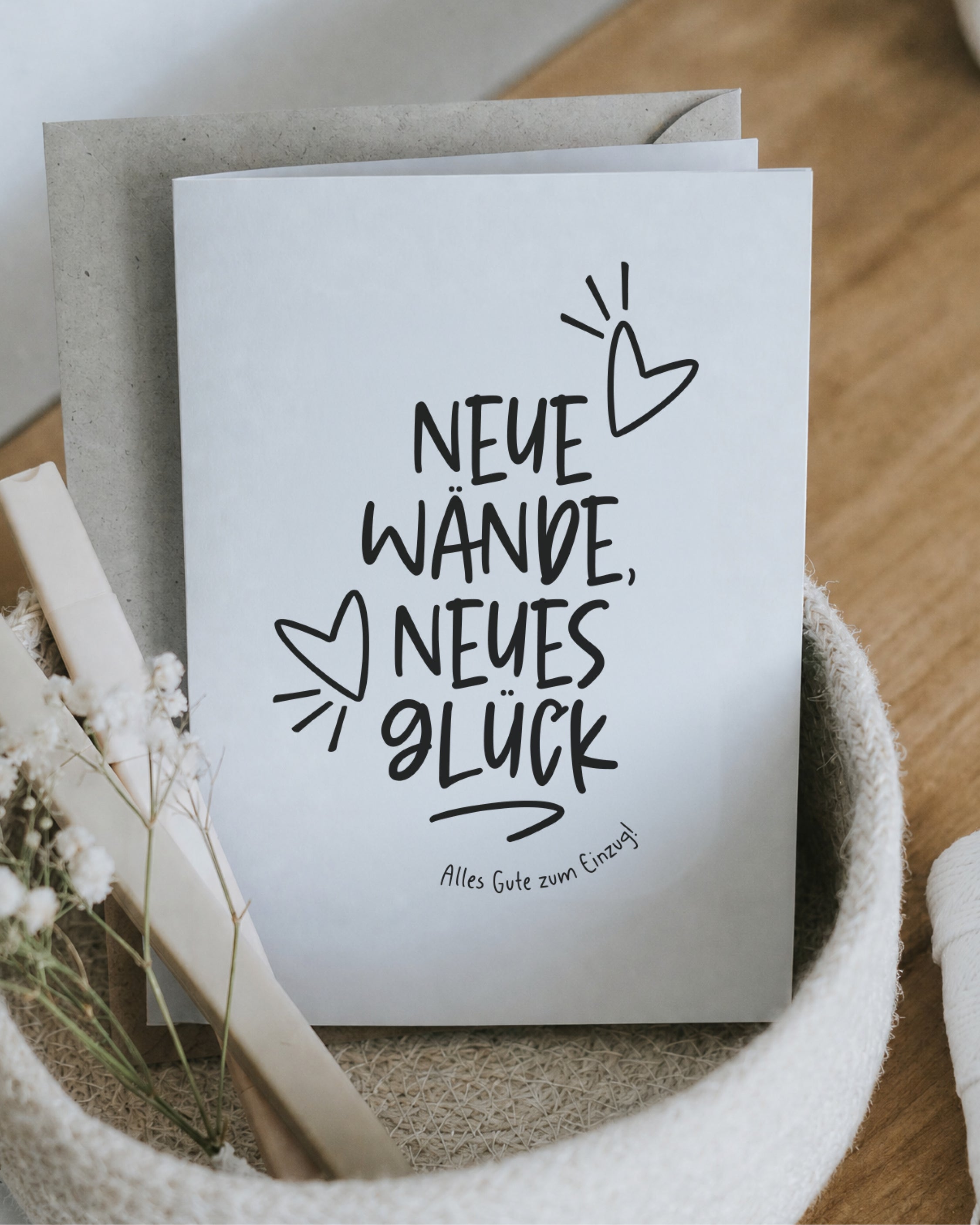 Klappkarte zum Einzug „Neue Wände, neues Glück. Alles Gute zum Einzug!“ in Schwarz-Weiß